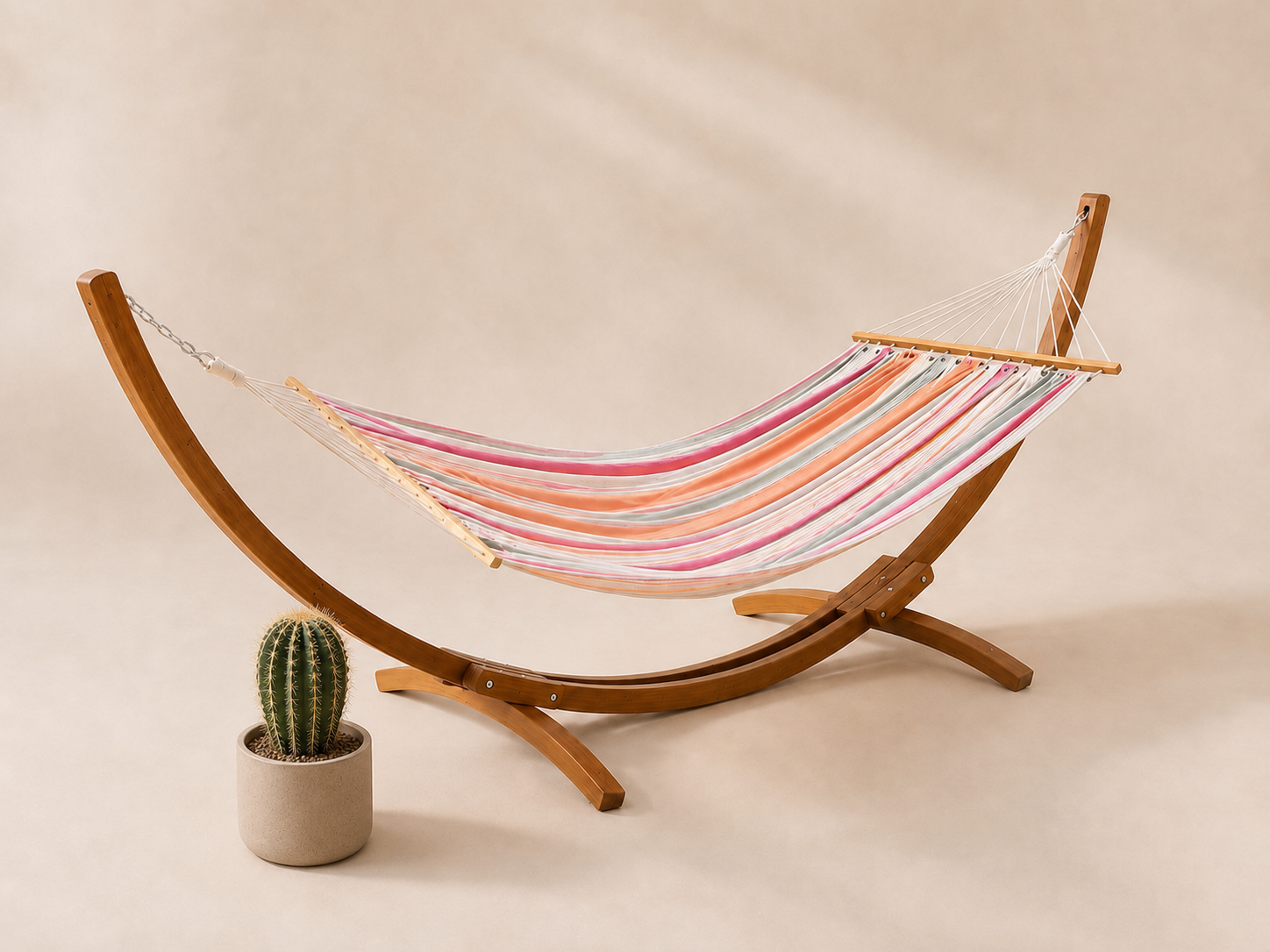 Rainbow striped hammock with wooden stand